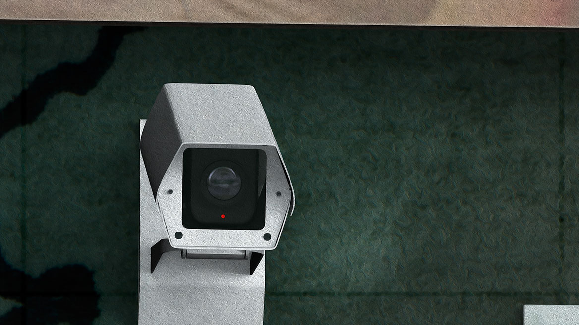 A surveillance camera in the enlargement. The surveillance cameras encircle the corona on the pedestal.