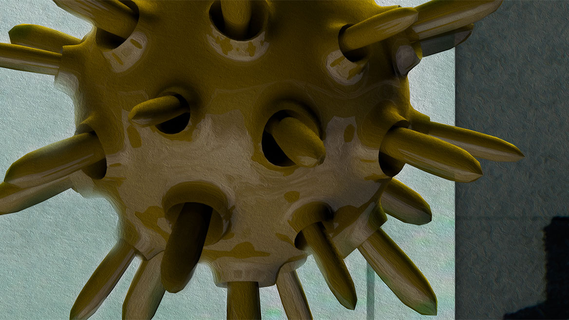 A large, yellow virus in detail. The surface looks like painted and reflects the environment.