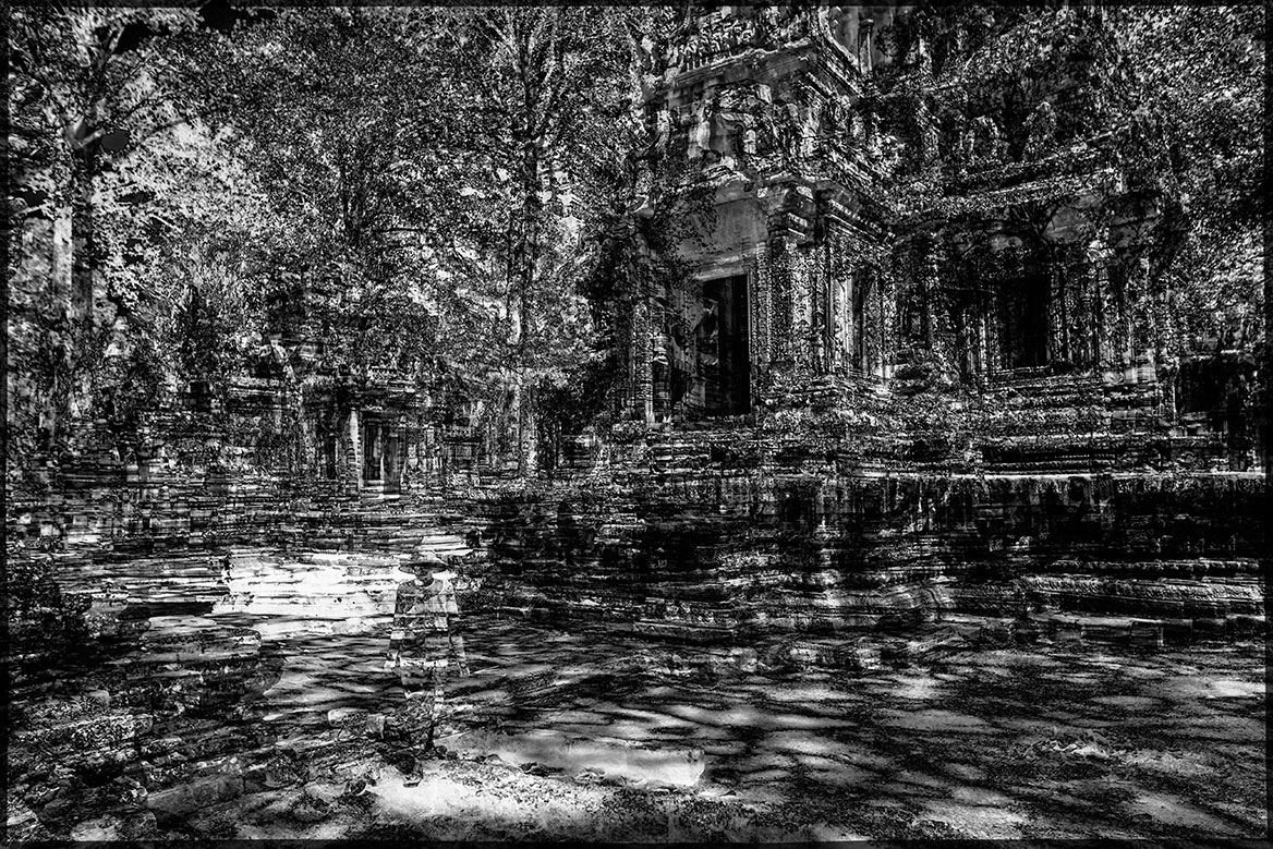 Another temple in Cambodia. An indigenous woman stands in the courtyard of the temple complex. As with all the images in this series, the artistic appeal comes from the image effects of superimposition and the shifts that result from the temporal delays.