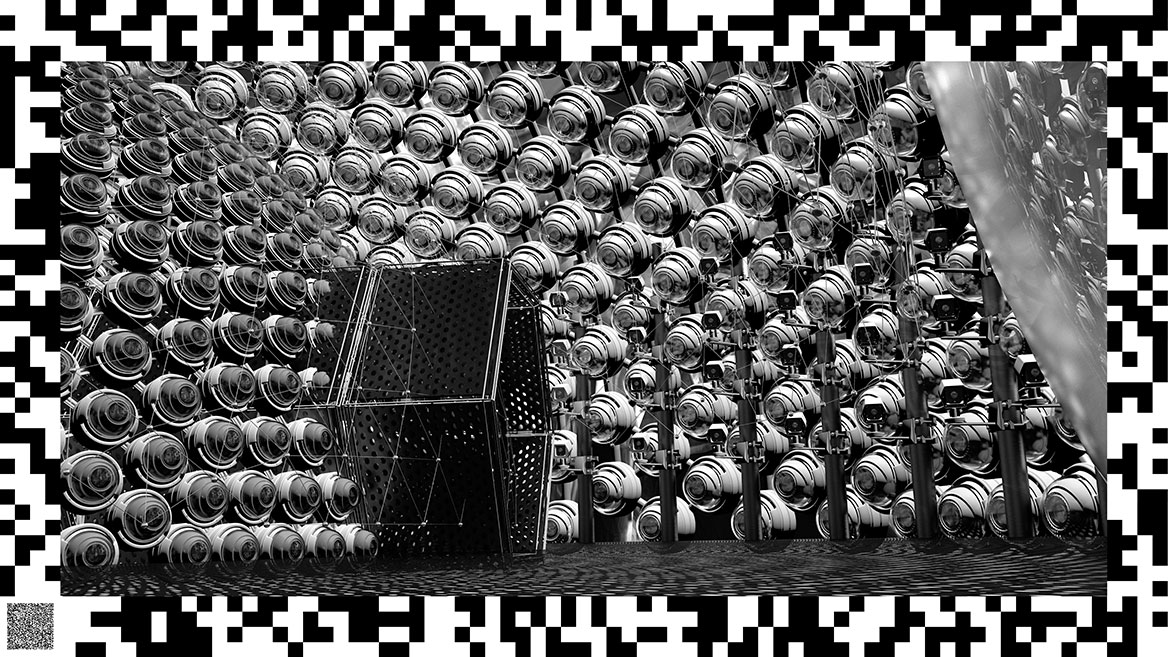 Condensed surveillance cameras in a dome building. A hexagonal entrance leads inside the dome.